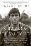 Chasing the Light: Writing, Directing, and Surviving Platoon, Midnight Express, Scarface, Salvador, and the Movie Game - Paperback
