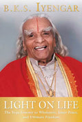 Light on Life: The Yoga Journey to Wholeness, Inner Peace, and Ultimate Freedom - Paperback