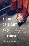 A Time of Light and Shadow: To Asia, Africa, and the Long Way Home - Paperback